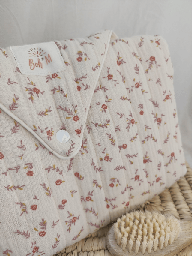Tapis à langer nomade écru à fleurs
